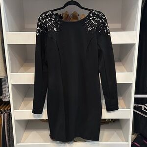 Le Chateau Elegant Black Dress with White Embellishments